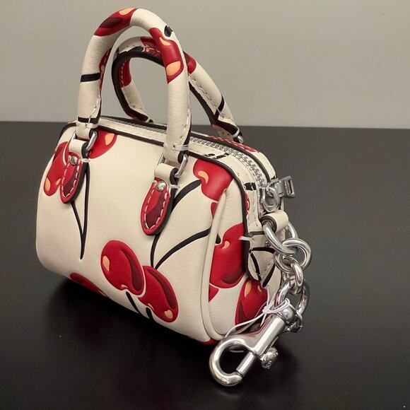 Coach CZ082 Mini Rowan Bag Charm With Cherry Print In Silver/Chalk Multi - Picture 3 of 6